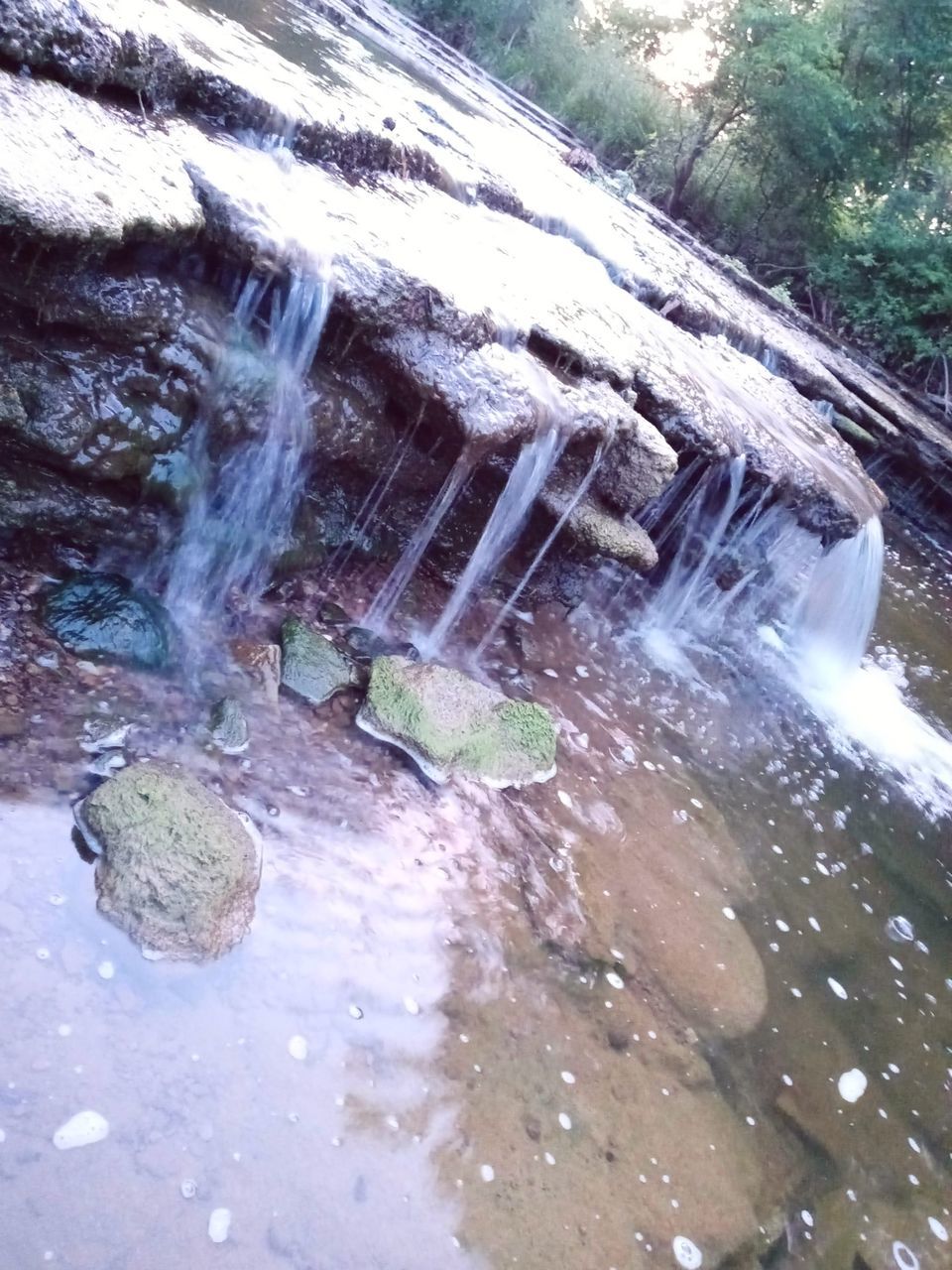 water, nature, waterfall, day, no people, motion, tree, water feature, flowing water, plant, beauty in nature, stream, high angle view, long exposure, body of water, outdoors, land, rock, scenics - nature, forest, blurred motion, environment, architecture, flowing, built structure, wood, tranquility, river