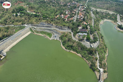 High angle view of river passing through city