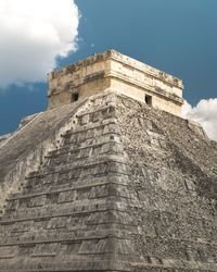 Low angle view of old building against sky