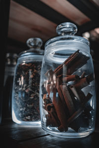 Close-up of glass jar on table