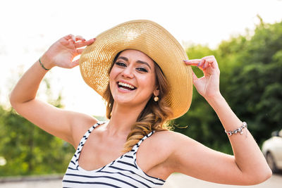 Portrait of smiling young woman