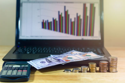 Close-up of coins on table