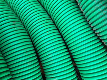 Full frame shot of dirty green plastic pipe