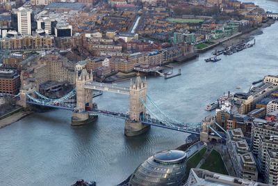 High angle view of tower bridge over thames river in city