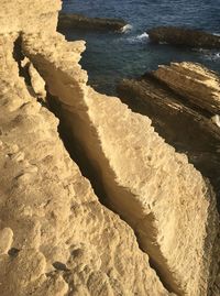 High angle view of rocks on beach