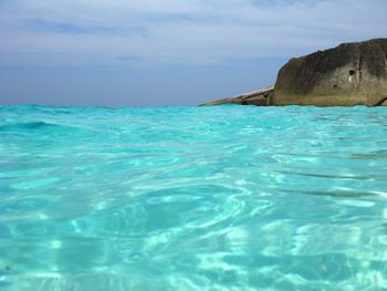 Scenic view of sea against blue sky