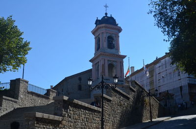 Low angle view of church against blue sky