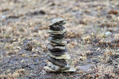 Stack of stones on field