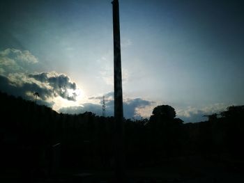 Silhouette trees against sky