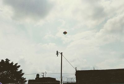 Low angle view of basketball hoop against sky