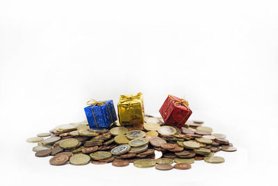 Close-up of coins on white background