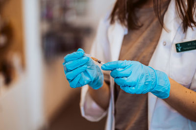 Midsection of woman working