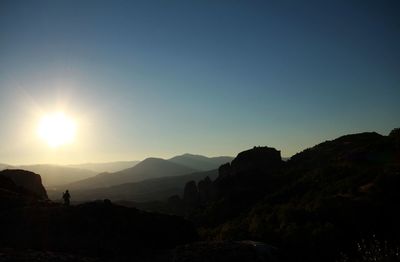 Scenic view of mountains against sky during sunset