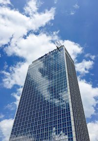 Low angle view of skyscraper against sky