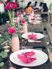 High angle view of pink roses on table