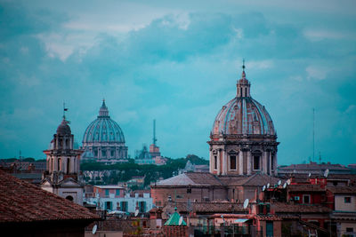 Cathedral in city against sky