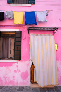 Clothes drying outside building