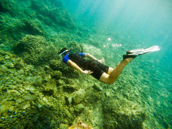 Man swimming in sea