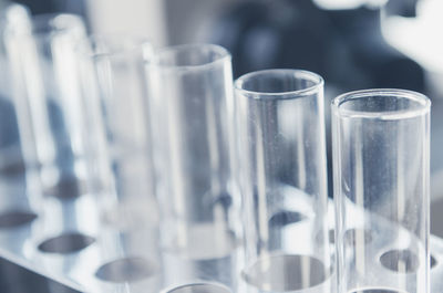 Close-up of test tubes in rack at desk