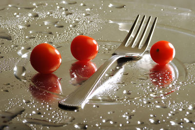 Close-up of tomatoes in plate on table