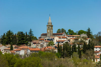 View of townscape against clear sky