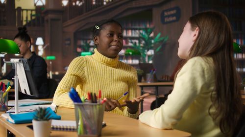 Side view of young woman looking away