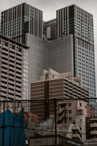 Low angle view of modern buildings in city