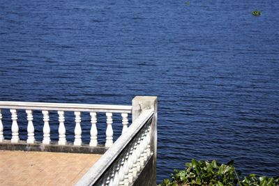 High angle view of sea against blue sky