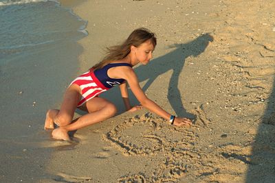 High angle view of  girl on beach