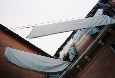 Low angle view of laundry drying outdoors