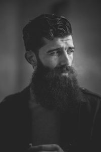 Portrait of young man looking away