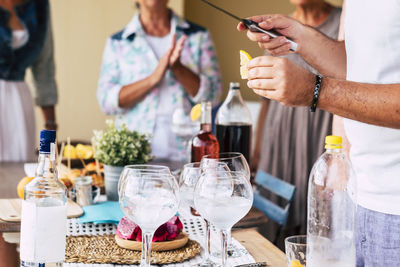 Friends at table during party