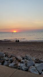 Scenic view of sea at sunset