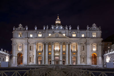 Low angle view of illuminated building at night