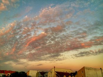 Low angle view of dramatic sky during sunset