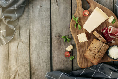 High angle view of fruits on cutting board