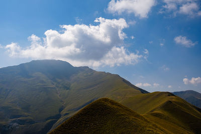 Scenic view of mountains against sky in montefortino, marche italy