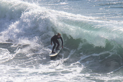 Man surfing in sea