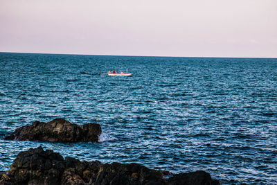 Scenic view of sea against clear sky