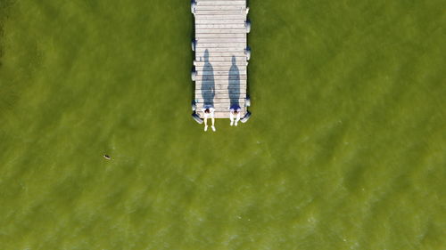 High angle view of pier on sea shore