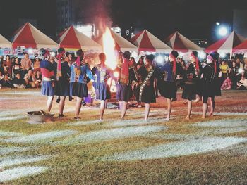 People at market stall