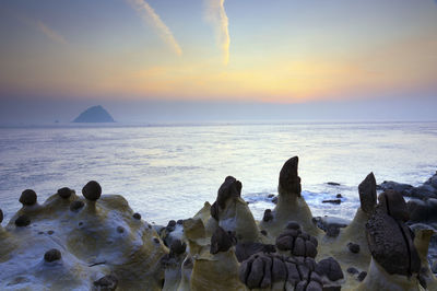 Panoramic view of sea against sky during sunset