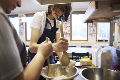 Women in kitchen preparing food