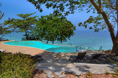 View of beach against blue sky