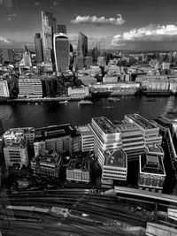 High angle view of river amidst buildings in city