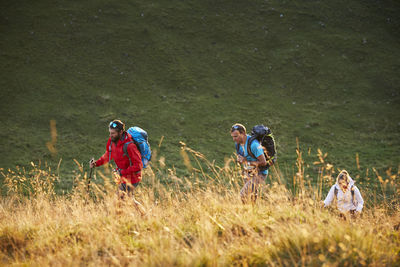 Hikers with backpacks on mountain, mutters, tyrol, austria