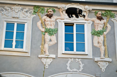 Low angle view of statue on building