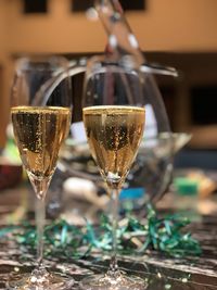 Close-up of wine in glass on table