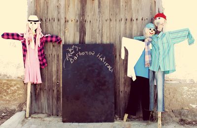 High angle view of women standing on wood