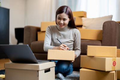 Young woman using laptop